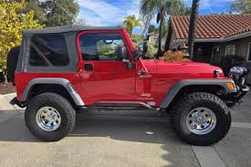 Image result for Flame Red 2005 Jeep