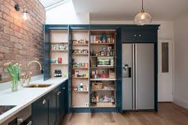 This Kitchen Spotted On Dezeen By Intervention Architecture Has No Upper Cabinets With The Kitchen Wall Cabinets Kitchen Wall Storage Interior Design Kitchen