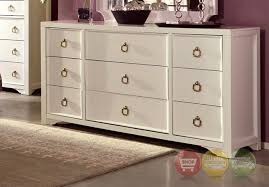 Reddish brown wood + see all. Furiani White 9 Drawer Dresser With Gold Accents