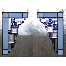 Western window systems, the manufacturer in charge of the windows of malibu crest, uses tempered glass as a default for open corner products due to its greater strength than regular glass. Edel Byrne Light Blue Small Geometric Corner Pair Stained Glass Panels Artistic Artisan Designer Stain Glass Window Panels Sweetheart Gallery Contemporary Craft Gallery Fine American Craft Art Design Handmade Home