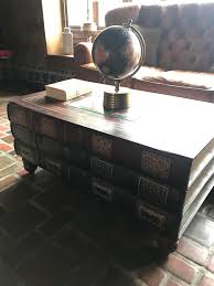 It is all hand made, hand upholstered and as you can see is in a rather space saving compact design and are very well. Coffee Table Made To Look Like Stacked Books Mildlyinteresting