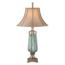 Stunning wooden dining tables are the best option for anyone looking to add a touch of class to their home. Green Ceramic Table Lamp With Aged Brass Accents Tan Shade