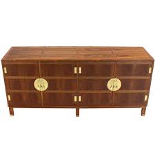 In excellent vintage condition, showing minor wear consistent with age and use. Baker Mid Century Modern Long Walnut Dresser Brass Hardware Pulls For Sale At 1stdibs