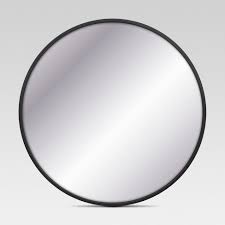 The unframed silhouette makes the most of the mirror's round shape, with small black hanging hardware that emphasizes the mirror's shapely simplicity. 28 Round Decorative Wall Mirror Black Project 62 Target
