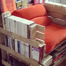 Created from recycled crates, this bookshelf is practical and easy to strategic placement of shelves allow you to spell just about anything, so let your imagination loose. Diy Pallets Chair With Book Storage Pallet Furniture Projects