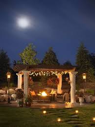 Pergola with vines and lights. Beautiful Examples Of How A Pergola Can Emphasize Your Garden