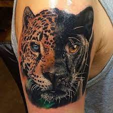Just something that i did in drivers ed because i'm. Natural Looking Illustrative Style Shoulder Tattoo Of Half Black Panther With Leopard Tattooimages Biz