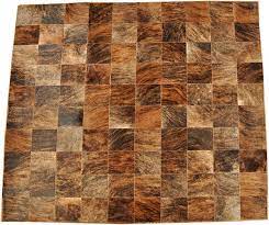 Dieser schöne teppich passt in jeden raum. Kuhfell Teppich Braun Exotisch 200 X 200 Cm Bei Kuhfelle Online