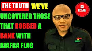 Ipob members carry biafran flag before a football match in. We Ve Uncovered The Identity Of The Criminals That Robbed A Bank With Biafra Flag Youtube