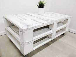 Now paint the pallet with white water color with brush because white color has its own unique and valuable beauty and charm. Distressed Pallet Coffee Table Lemmik In Aged White Finish Made Of Reclaimed Timber Coffee Table Pallet Coffee Table Reclaimed Timber