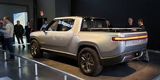 Rivian forum r1t pickup truck r1s suv r2r rally vehicle. Rivian Adventure Truck Customers Like Company S Low Key Approach Trucks Com
