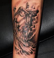This jesus tattoo design is of jesus on the cross and is done with all black ink. Tattoos Of Jesus Christ On The Cross Tattoos Gallery