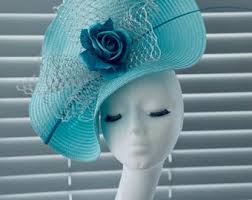 Ascot Ladies Race Day Occasion Headpiece Hat Fascinator in Turquoise and  Silver With Quill, Veiling and Silk Flower Detail