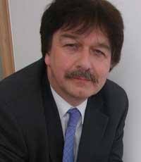 Trust boss takes up new post