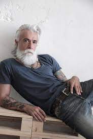 Image May Contain 1 Person Sitting Beard And Indoor Older Mens Hairstyles Awesome Beards Long Hair Beard