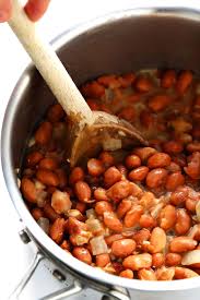 Step 3 smash garlic cloves in skillet with a fork. The Best Refried Beans Gimme Some Oven