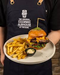 Nothing beats a big juicy beef burger 🤤 THE BIG EARL BURGER 200g  char-grilled dry-aged beef patty,double cheese, bacon, tomato, mesclun  leaves & pickles