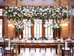 Kristin La Voie Photography Vale Of Enna Flowers Cafe Brauer Venue Chicago Wedding Lush H Chicago Wedding Hanging Candles Wedding Wedding Reception Candles
