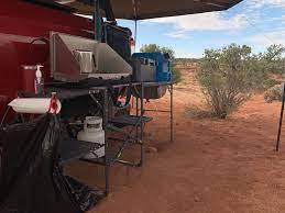 The master cook station has a section of the aluminum tabletop that folds back to reveal a sink. Overland Essentials Master Cook Station From Gci Outdoors The Gear Bunker