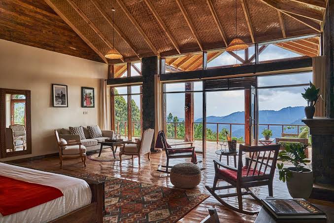Kyaninga Lodge overlooking green hills near Fort Portal Uganda