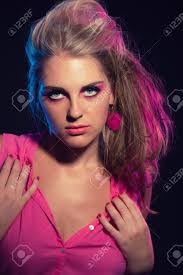If you look closely, you can see that the country music idol's bouncy blonde curls are adorned with a large floral hair accessory. Sensual Retro 80s Fashion Girl With Pink Dress And Long Blonde Stock Photo Picture And Royalty Free Image Image 20903727