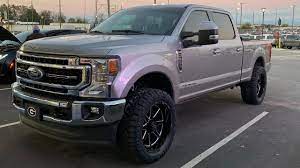 Ford F250 Lariat Covert Leveled On 35s Iconic Silver 2020 Akins Custom B Ford F250 F250 Ford