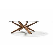 An ottoman coffee table, also known as a cocktail ottoman, offers a stylish and functional accent to the living room.perfect for extra seating, setting serveware or holding a drinks tray, it's a great centerpiece amongst sofas and loveseats.check out our wide selection of styles to match the decor of your space. Circular Glass Coffee Table You Ll Love In 2021 Visualhunt
