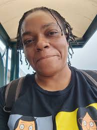 How to get bandaid out of hair?