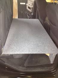 Dog Seat Bed In Back Of Truck Rear Seats Folded Up And Built A Platform For Out Lab To Be Comfortable Truck Accessories Dog Car Accessories Truck Bed