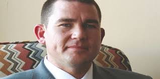 County board debates coroner's salary