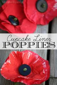 Have fun turning colorful cupcake liners into pretty paper flowers. Painted Cupcake Liner Poppy Craft Happy Hooligans