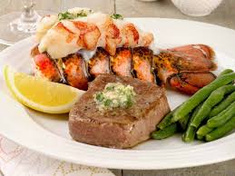 Herb roasted lobster and steak. Surf And Turf Dinner Recipe Mygourmetconnection