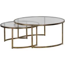 The base of this cocktail table is crafted from natural, unfinished teak driftwood, which supports a round clear glass top. Driftwood Coffee Table By Uttermost 25519 Gladhill Furniture