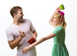 Young couple has fun in kitchen, dancing and entertaining. Couple Having Fun In Kitchen Funny Couple Fight With Utensils While Cooking At Home Together Husband Wife Having Fun While Cooking Breakfast Man And Woman Have Funny Fight At Kitchen Happy Family Stock Photo Adobe Stock