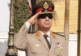 الرئيس عبد الفتاح السيسي بالزي العسكري مع مجموعة من الضباط في سيناء (رويترز). ØªØ¹Ø²ÙŠØ© ÙˆØ§Ø­ØªÙØ§Ù„ Ù…Ù†Ø§Ø³Ø¨ØªØ§Ù† Ø§Ø±ØªØ¯Ù‰ ÙÙŠÙ‡Ù…Ø§ Ø§Ù„Ø³ÙŠØ³ÙŠ Ø§Ù„Ø²ÙŠ Ø§Ù„Ø¹Ø³ÙƒØ±ÙŠ Ù…ØµØ±Ø§ÙˆÙ‰