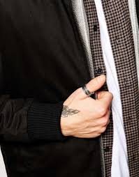 Minimalistic 14k solid gold ring in matt finish. A Guide To Rings For Men What Rings Mean On Each Finger