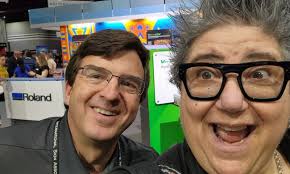 My favorite thing about the Roland DGA booth tour at #isasignexpo was the  pride in Dave Edmondson showing off his presses and what they can make.