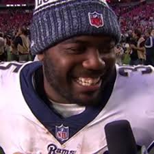 C. J. Anderson goes from watching football