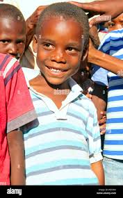 Child water haiti hi-res stock photography and images