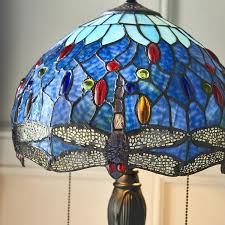 Inspired by the hanging head dragonfly lamp originally designed by louis comfort tiffany and clara driscoll, this mini version encompasses great detail and lively character. Blue Dragonfly Small Tiffany Table Lamp 64090 Tiffany Lighting Direct