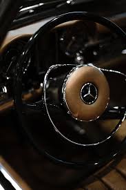 A Girl Inspired Steering Wheel Benz Stock Photos