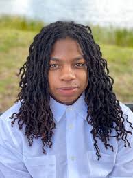 Overcoming Adversities: Tyrone Hayes' Football Journey at Okeechobee High  School