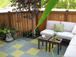Patio Oasis Small Townhouse Backyard Turned Into An Outdoor Living Space Using Custom Stained Ceme Small Patio Ideas Townhouse Patio Design Small Patio Design
