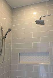 The Idea Of Remodeling A Washroom By Changing Floor Ceramic Tiles Might Be Required Since You Feel B Shower Tile Subway Tile Showers Subway Tile Shower Designs
