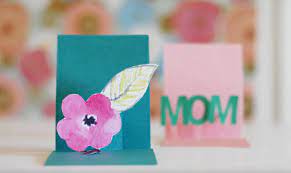 Place the hand on the white piece of paper. Make A Pop Out Mother S Day Card Craftsy