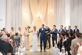 Their color scheme was white with accents of gold. White And Gold Wedding Ceremony Chez Chicago Wedding Venue