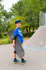 Find & download the most popular boy model photos on freepik free for commercial use high quality images over 10 million stock photos. Happy Young Boy In A Trendy Blue Outfit Carrying His New Skateboard At The Skate Park Turning To Give The Camera A Beaming Smile Stock Photo Picture And Royalty Free Image Image