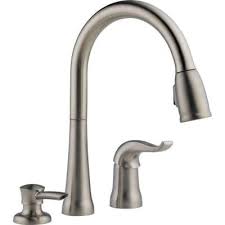 Easily switch from stream to spray for any kitchen needs. Delta Kate Single Handle Pull Down Sprayer Kitchen Faucet With Magnatite Docking And Soap Dispenser In Stainless 16970 Sssd Dst The Home Depot Kitchen Faucet Kitchen Sink Faucets Faucet