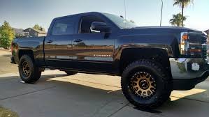 Upgrade to wicked stylish wheels from method that will make your rig the center of attention. Method Racing Wheels 17 Bronze Nvs Wrapped In 35 Ko2 Bfgoodrich Tires Chevy Trucks Lifted Chevy Trucks Chevy 1500