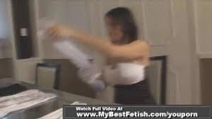 She slowly start the show by showing us her new manicure and put on few pairs of white and black satin. White Satin Gloves And Handjob Simulation